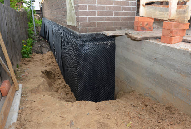 SJ Waterproofing Pros technician performing targeted Sump Pump Installation assessment in Scandinavia, WI